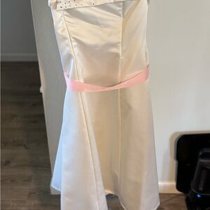 Elegant White Gown with Pink Accent